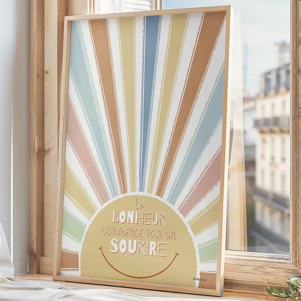 Dessin d'un soleil multicolore, ses rayons couvrent toute la page. "Le bonheur commence par un sourire" est écris au dessus d'un dessin de sourire