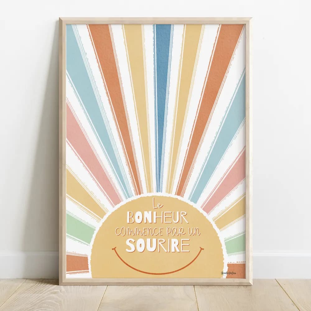 Dessin d'un soleil multicolore, ses rayons couvrent toute la page. "Le bonheur commence par un sourire" est écris au dessus d'un dessin de sourire